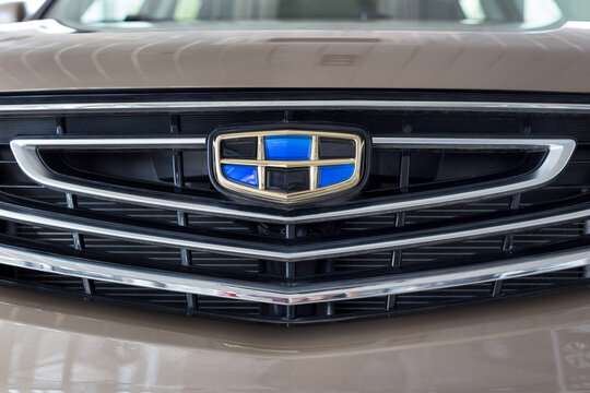 Russia, Izhevsk - August 14, 2020: Geely showroom. Logo of Geely on bumper of CoolRay car. Car manufacturer from China.