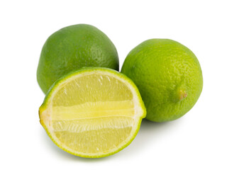 Fresh ripe green limes isolated on white background.