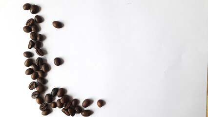 Coffee beans isolated on a white background with copy space for writing text