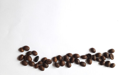 Coffee beans isolated on a white background with copy space for writing text