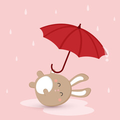 bunny with an umbrella in the rain. symbol of 2023