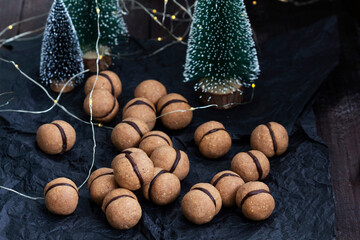 Lady's kisses, traditional Italian nut cookies with coffee and chocolate filling.