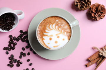 hot cappuccino with latte art isolated in pink background
