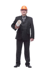 An architect wearing a hard hat and holding plans