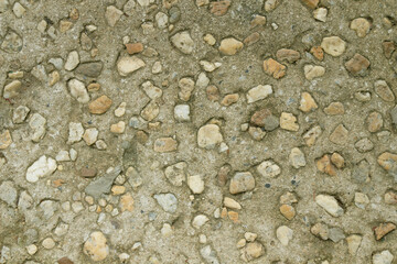 small stones in decorative cement floor