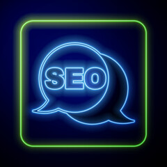 Obraz premium Glowing neon SEO optimization icon isolated on blue background. Vector