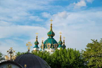 Fototapeta na wymiar orthodox christianity religion church in kyiv with cupolas and crosses