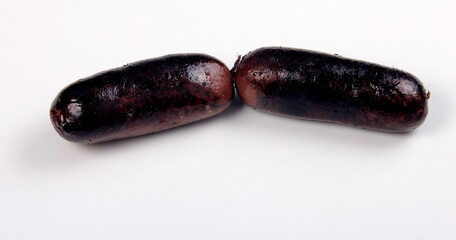 Whole blood sausages on white background, Traditional latvian blood sausages