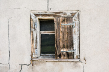 Naklejka na ściany i meble close up shot of old window in the wall
