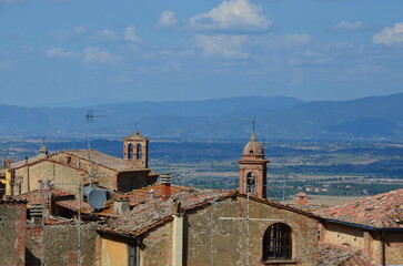 Fototapeta na wymiar The beautiful countryside and town of Montepulciano in Tuscany on a bright summer day