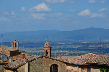 Fototapeta na wymiar The beautiful countryside and town of Montepulciano in Tuscany on a bright summer day