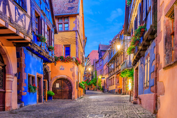 Riquewihr, France. Picturesque street with traditional half timbered houses on the Alsace Wine Route.