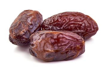 Dried dates Medjool, close-up isolated on white background. High resolution image.