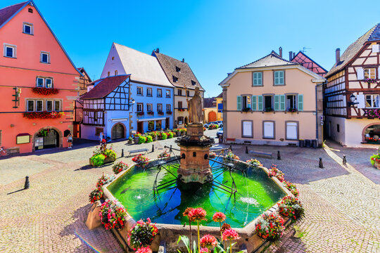 Eguisheim, France. Colorful half-timbered houses in Castle Square, Alsace.