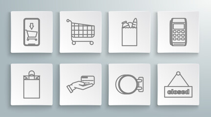 Set line Paper shopping bag, Shopping cart, Human hand holding with credit card, Signboard hanging, Hanging sign text Closed, food, Pos terminal and Mobile phone icon. Vector