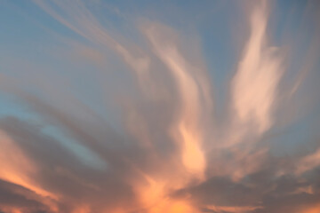 Gray and orange sunset sky as a dramatic background