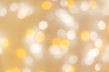 Abstract bokeh background beige colored, natural flare from lights, beige monochromatic photo with...