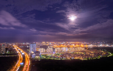 Fototapeta premium Aerial view of Bitexco Tower, buildings, roads, Thu Thiem 2 bridge and Saigon river in Ho Chi Minh city - Far away is Landmark 81 skyscraper. Travel concept.