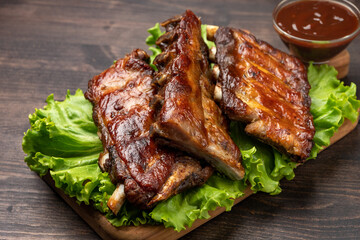 Grilled ribs with barbecue sauce and ketchup