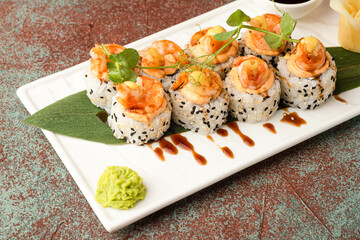 Sushi, rolls, sushi with fish on a textured background, side view
