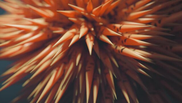 Orange urchin-like alien lifeform swimming underwater.