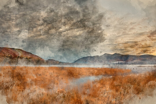 Digital watercolour painting of Absolutely stunning vibrant Autumn sunrise landscape image looking from Manesty Park in Lake Distict towards sunlit Skiddaw Range 