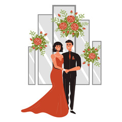 Husband and wife at the wedding. The award ceremony in a red dress. Wedding decor. The bride and groom dance the tango