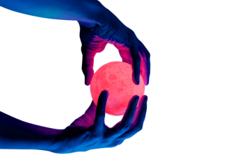Human migician hand holding red illuminated sphere. Surrealistic collage element, contemporary art for design, posters and banners. Neon purple light. Pop fantasy style