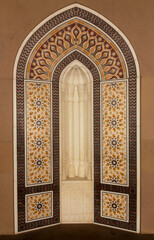 Arabian style background in brown yellow colors. Oriental eastern ornament, Muscat, Oman. Sultan Qaboos Grand Mosque