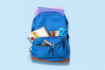 Back to school concept with backpack with school supplies set