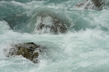 Blue spring water stream, Norway, Briksdal. National park Jostedalsbreen.
