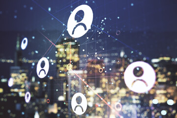 Fototapeta premium Double exposure of social network icons hologram on blurry office buildings background. Networking concept