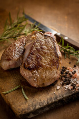 grilled tenderloin with ingredients over wood