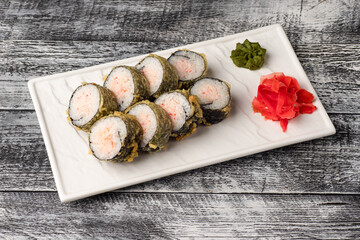 Sushi, rolls, sushi with fish on a white wooden background
