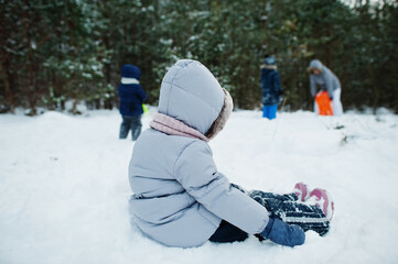 Fototapeta na wymiar Children in winter nature. Outdoors in snow.