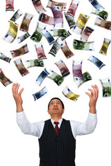 Manager greedily grabs falling euro notes. 