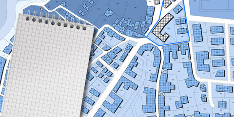 Imaginary cadastral map of territory with buildings, roads, land parcel and notepad with copy space