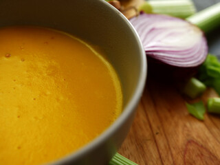 Homemade vegetable soup in a bowl close up shot 