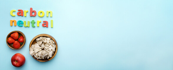 Local organic vegetables and fruits with carbon neutral emission label. Top view. Copy space