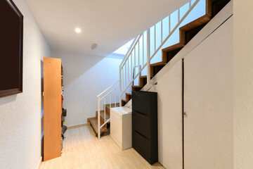 Wardrobes and stairs in a multi-storey single-family home