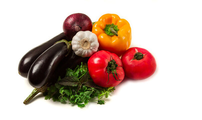 set of vegetables, for the Turkish dish Imam Bayaldy, eggplant, tomatoes, herbs, sweet pepper, red onion and garlic, on a white background,