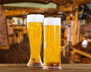 Two glasses with beer in bar, drink concept