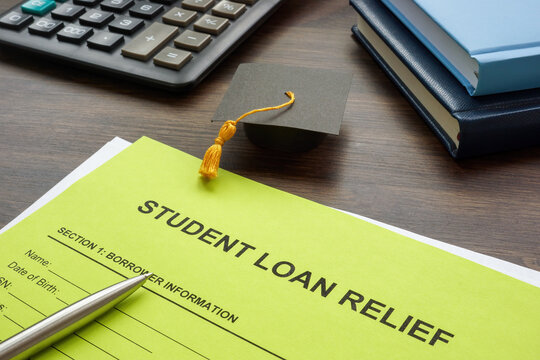 Student loan relief application form and pen.