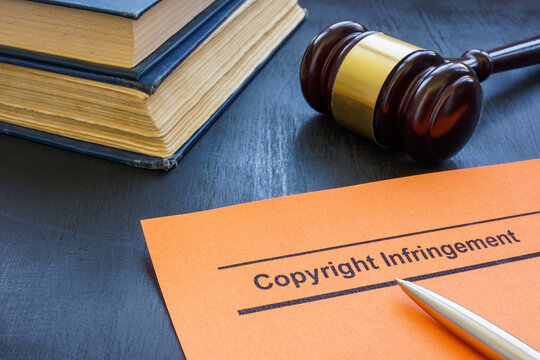 A Document about copyright infringement and gavel.