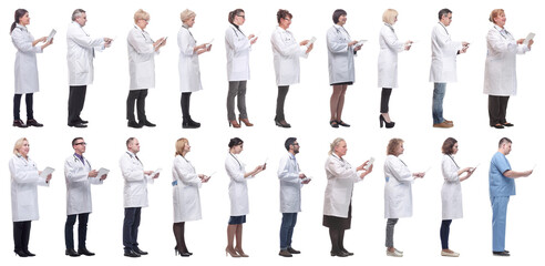 Obraz premium group of doctors with clipboard isolated on white