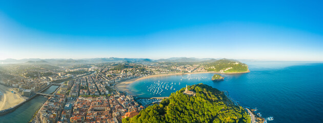 Fantastic aerial perspective of Donostia - San Sebastian city. View of the statue of 