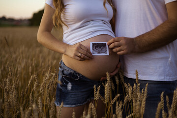 a family of two waiting for baby
