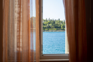 Fototapeta na wymiar sea and island view from open window