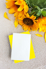 postcard layout. bouquet of sunflowers on a white background and space for text	
