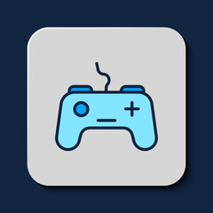 Filled outline Gamepad icon isolated on blue background. Game controller. Vector